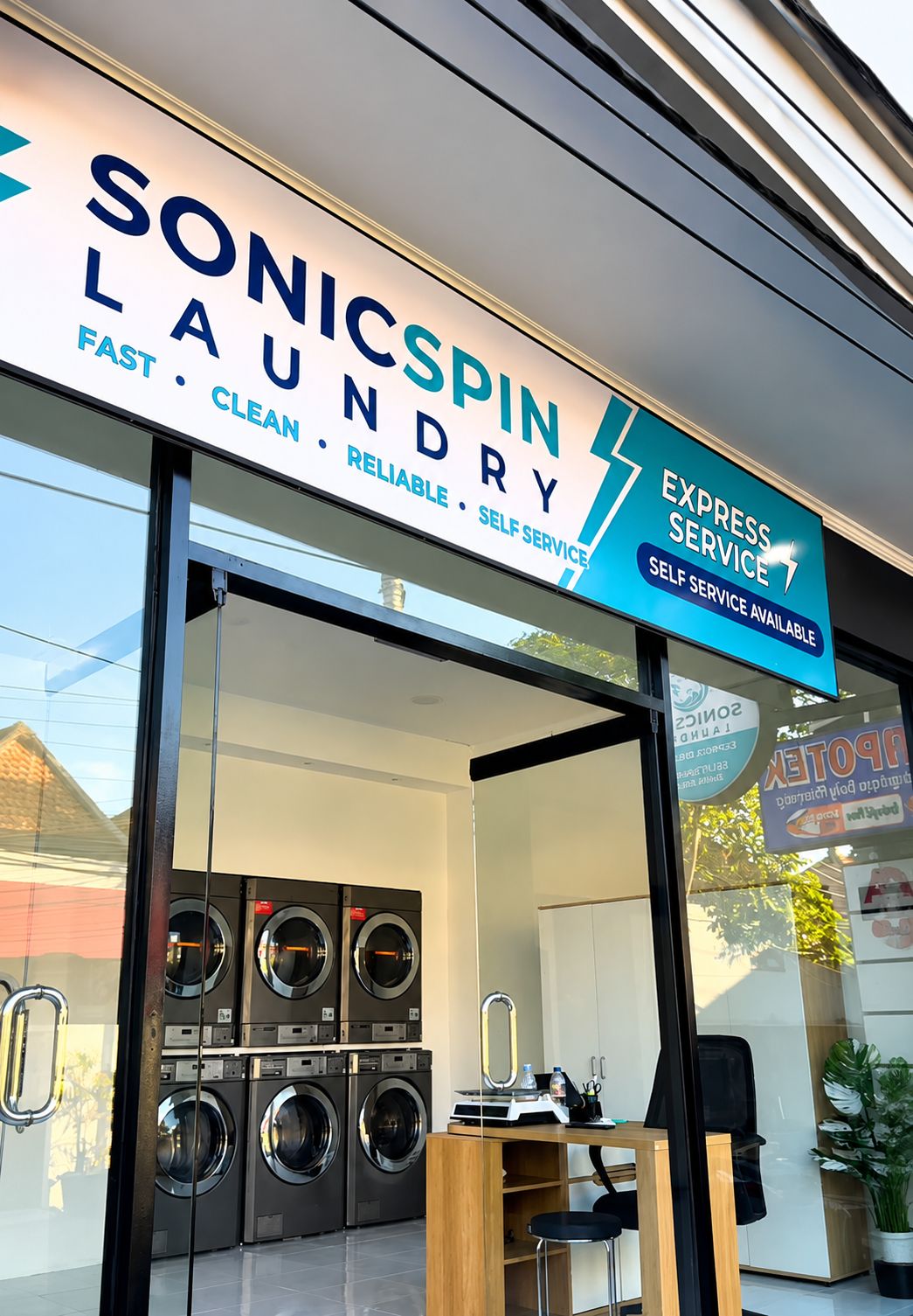 SonicSpin Laundry brand-new self-service machines through the shopfront